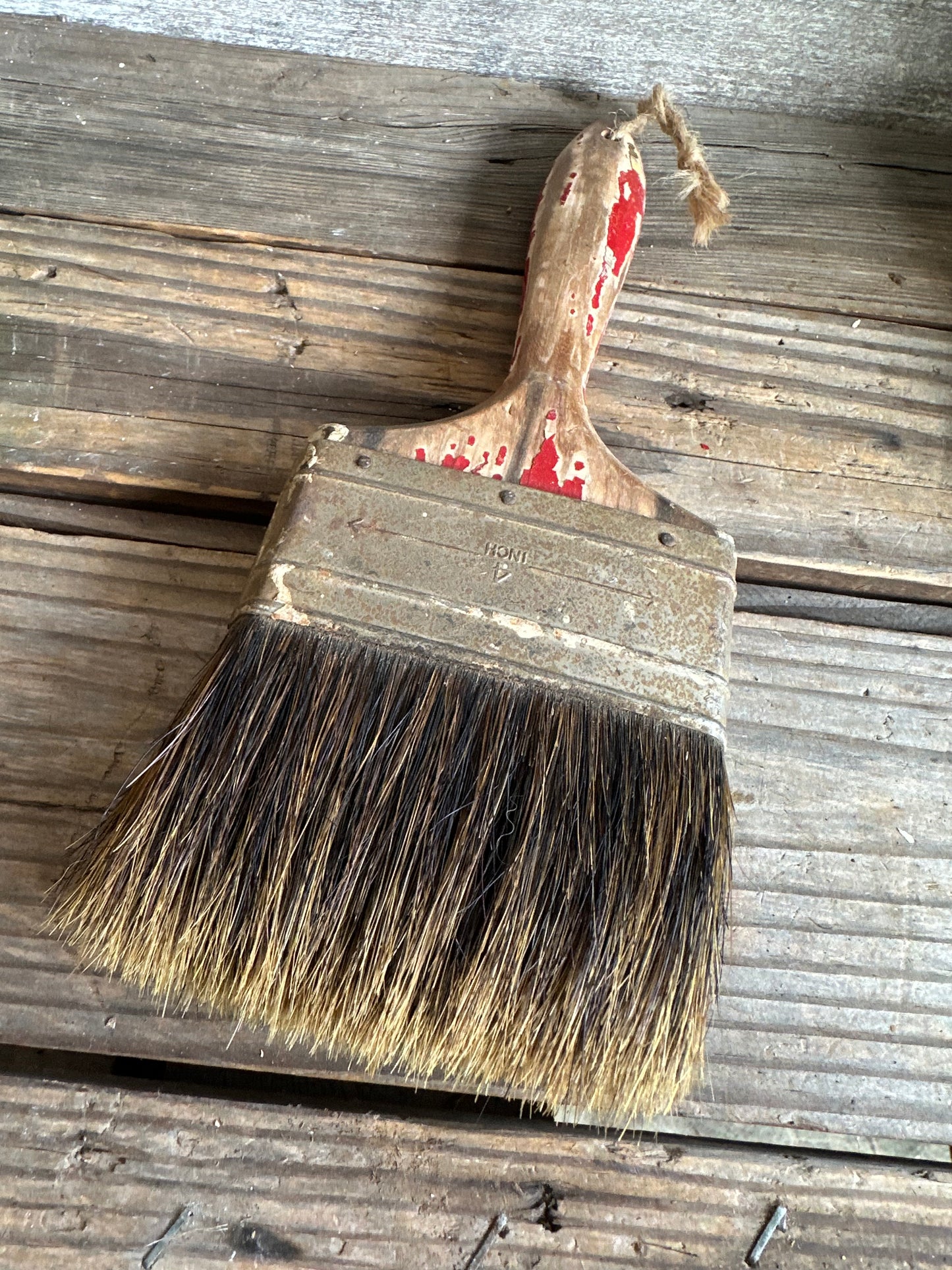 Chippy Red Paint Handle Paint Brush