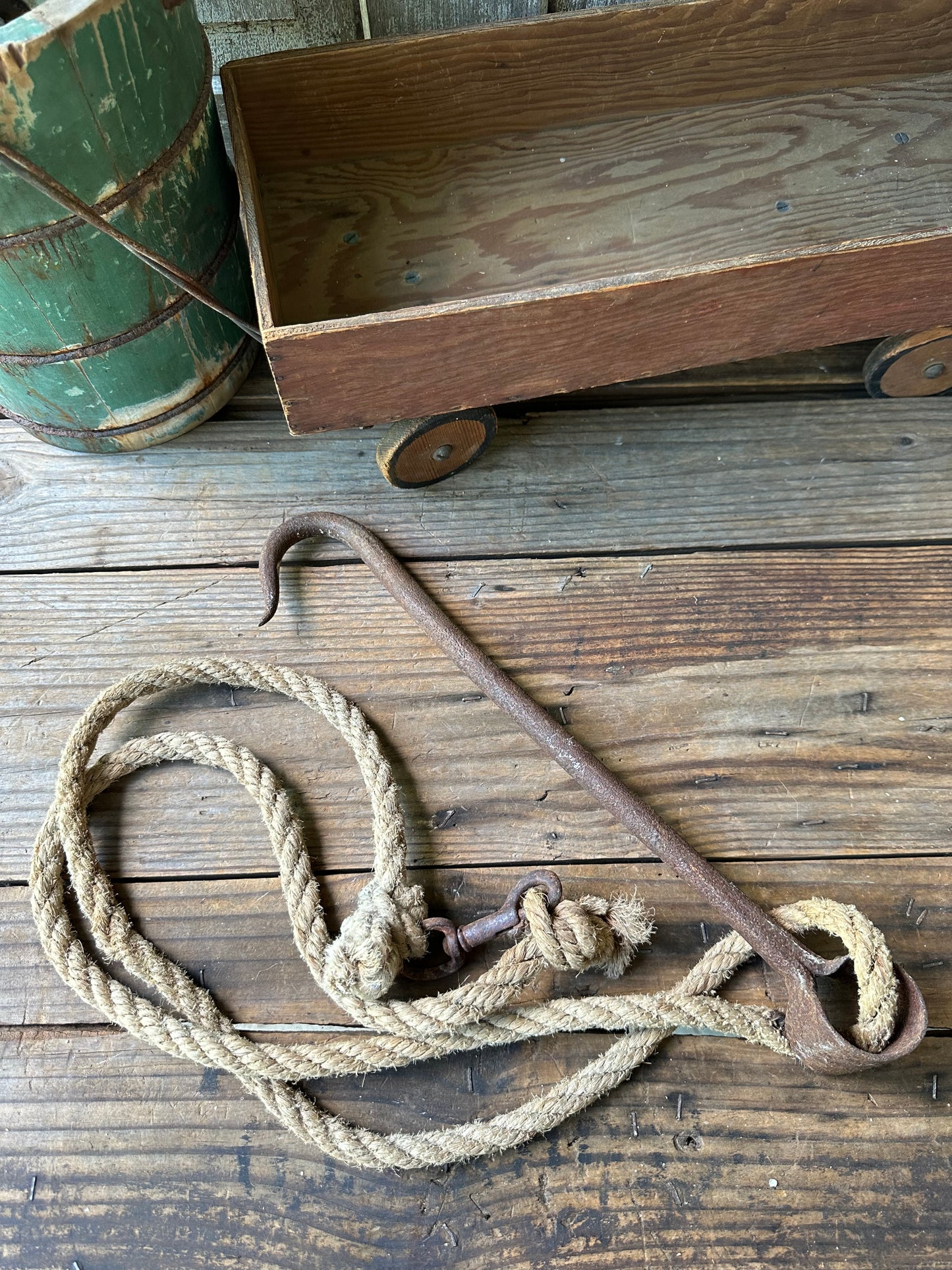 Rusty Metal Hook With Rope