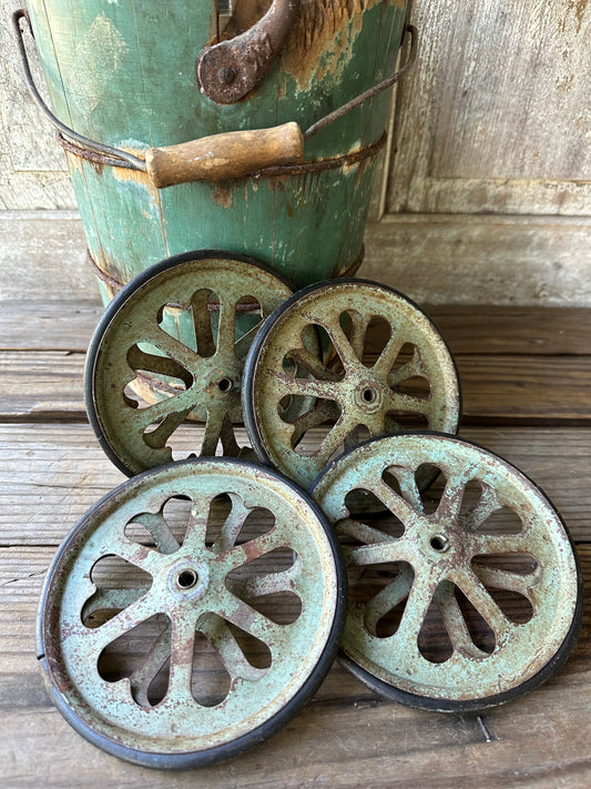 Set Of Four Rusty Metal Heart Design Wheels
