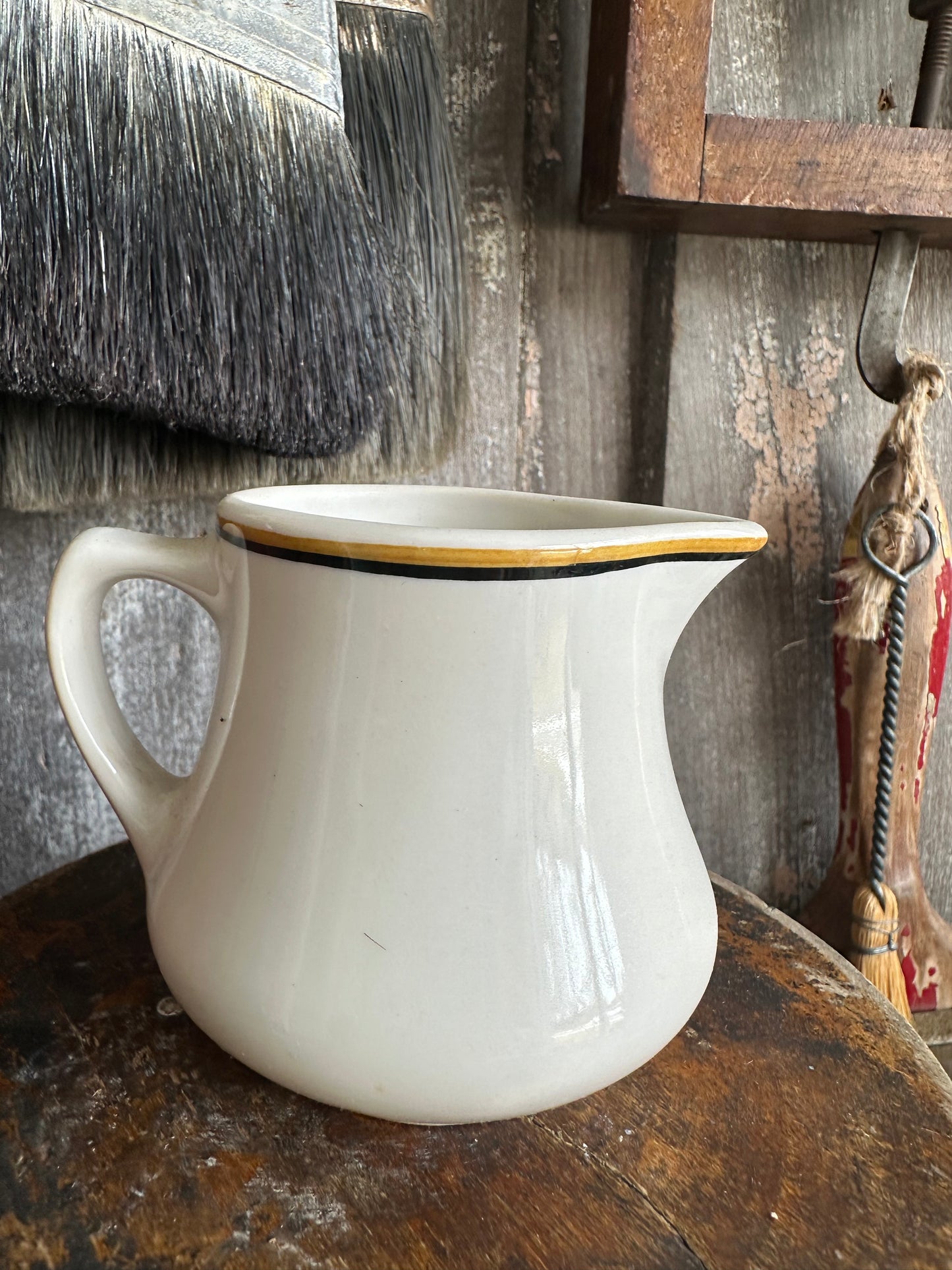 Creamer Black Rusty Orange Stripe