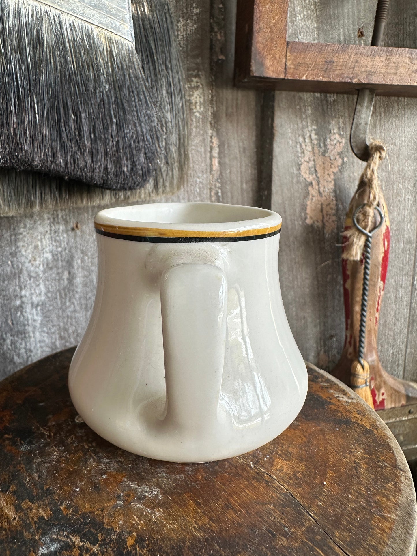 Creamer Black Rusty Orange Stripe