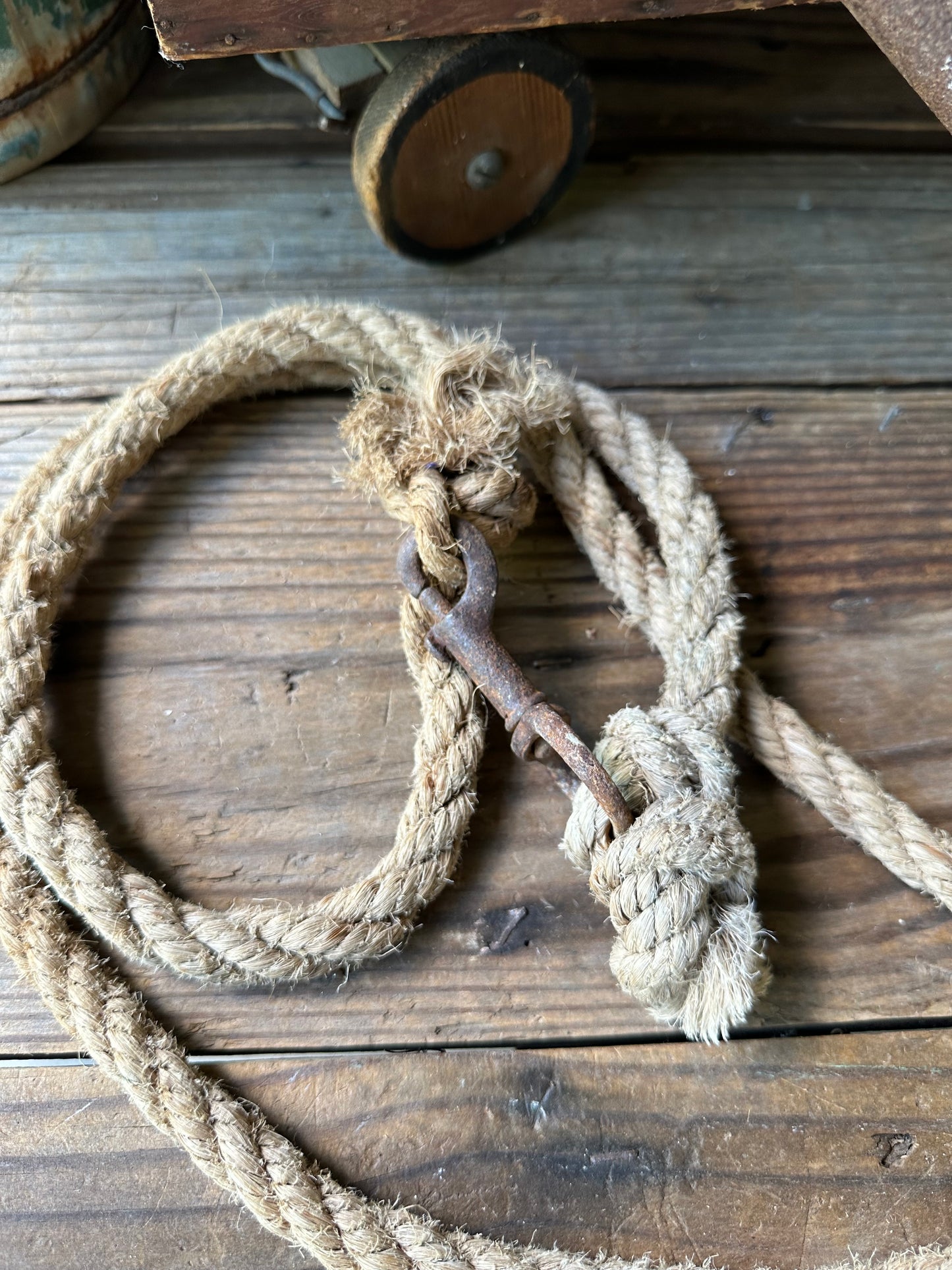 Rusty Metal Hook With Rope