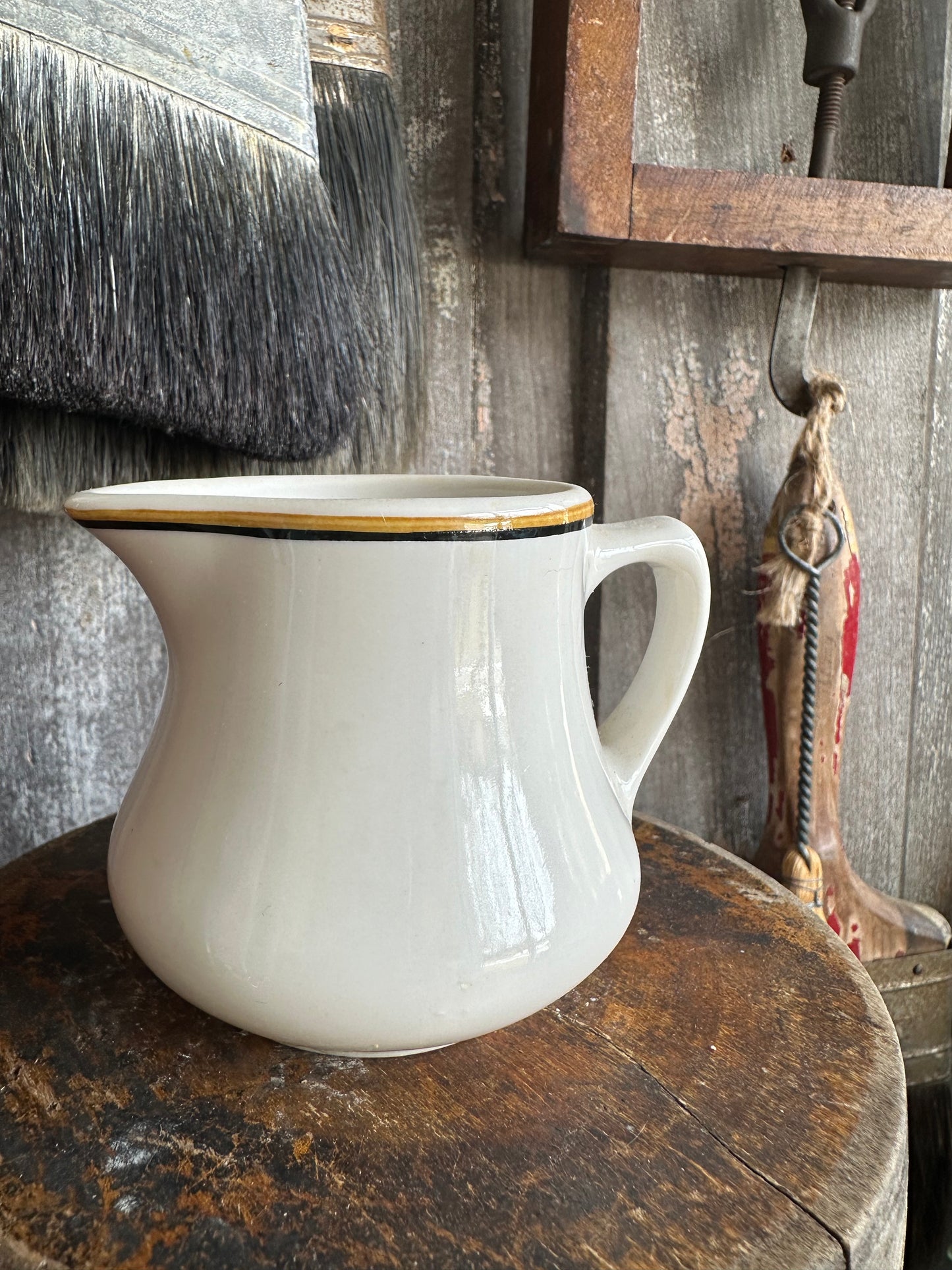 Creamer Black Rusty Orange Stripe